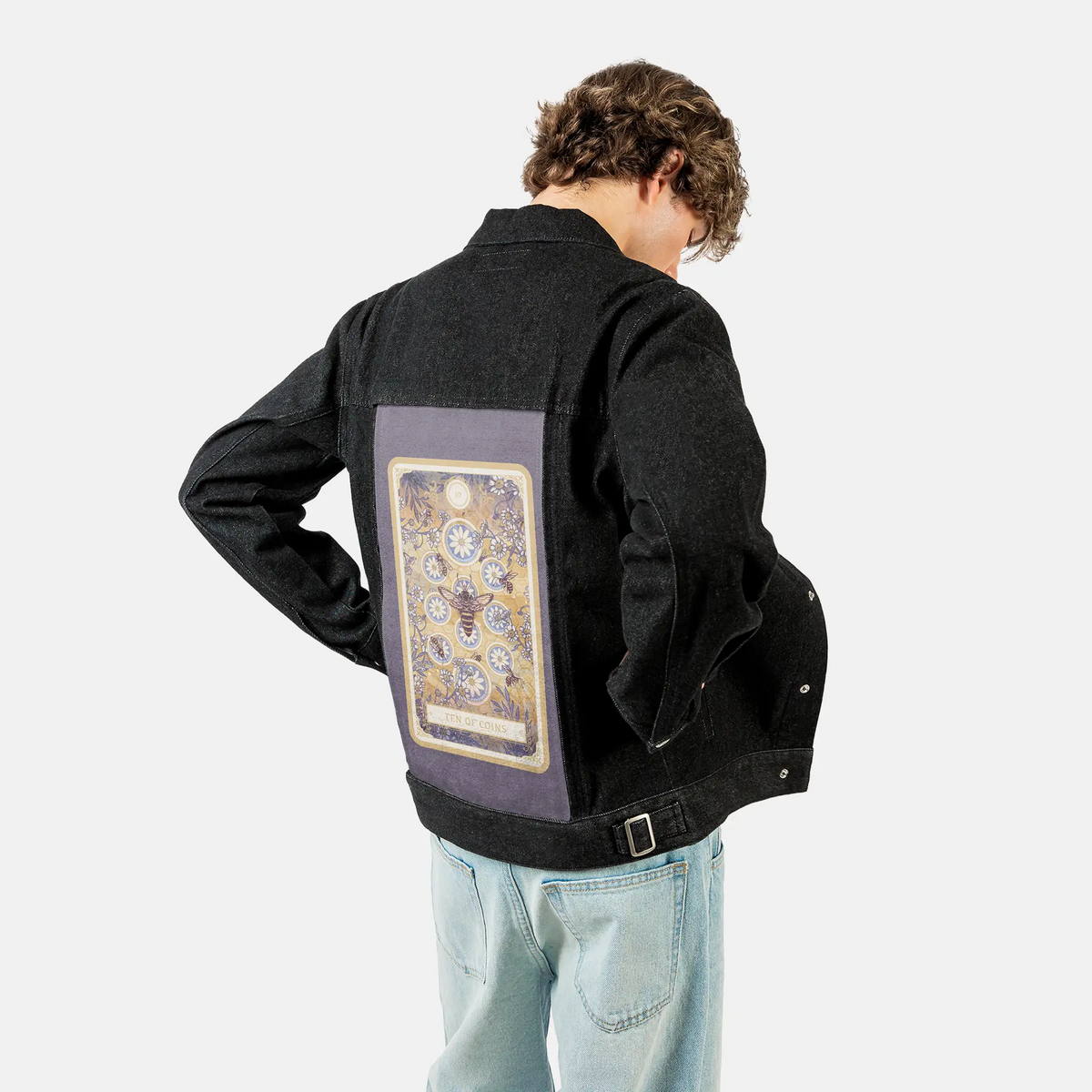 tenofcoins patch on male og denim jacket in raven