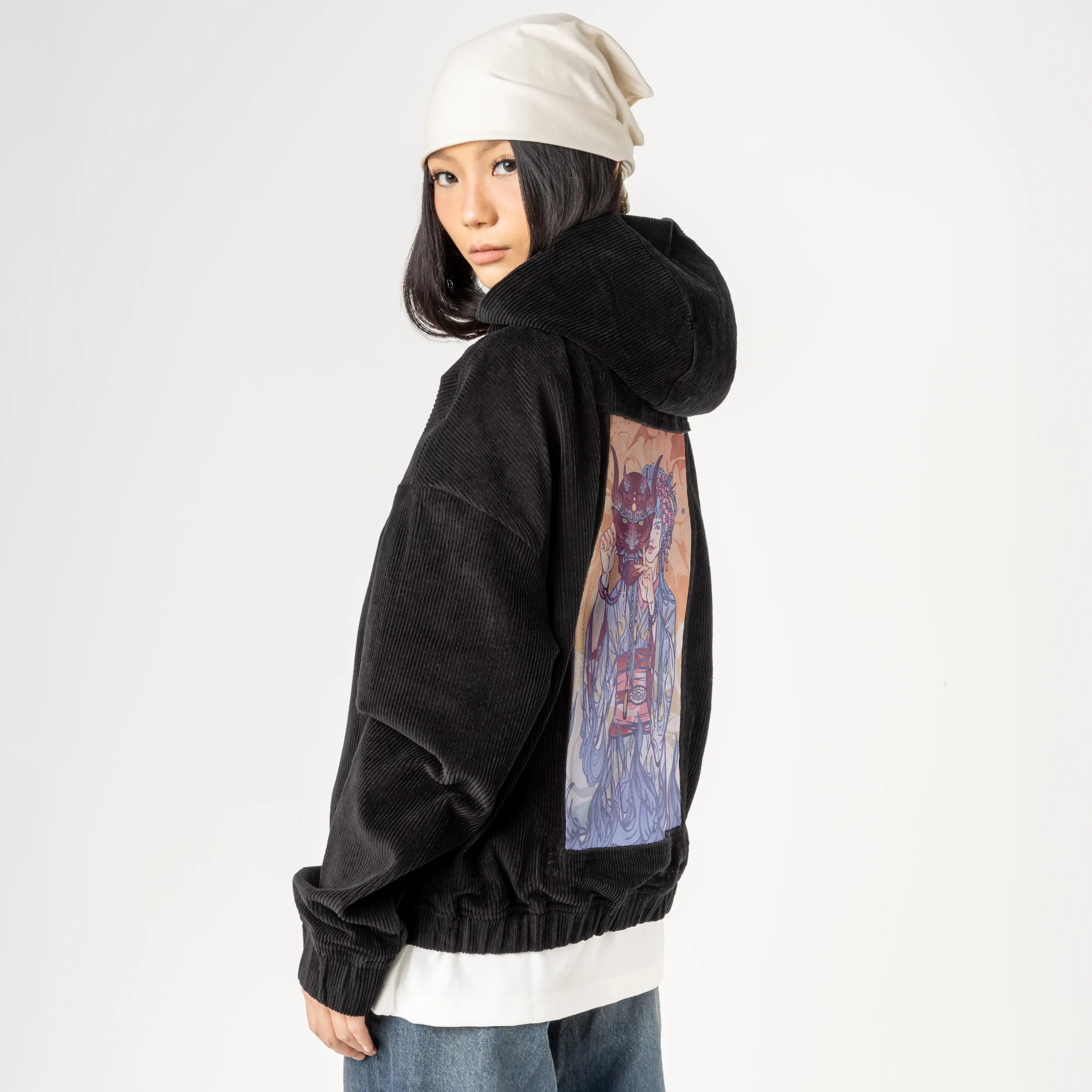 thedevil patch on female retro cord hoodie in onyx