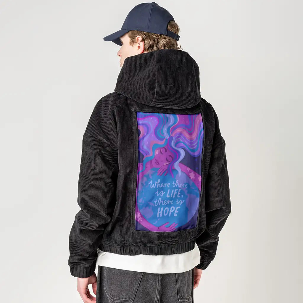 thereishope patch on male retro cord hoodie in onyx