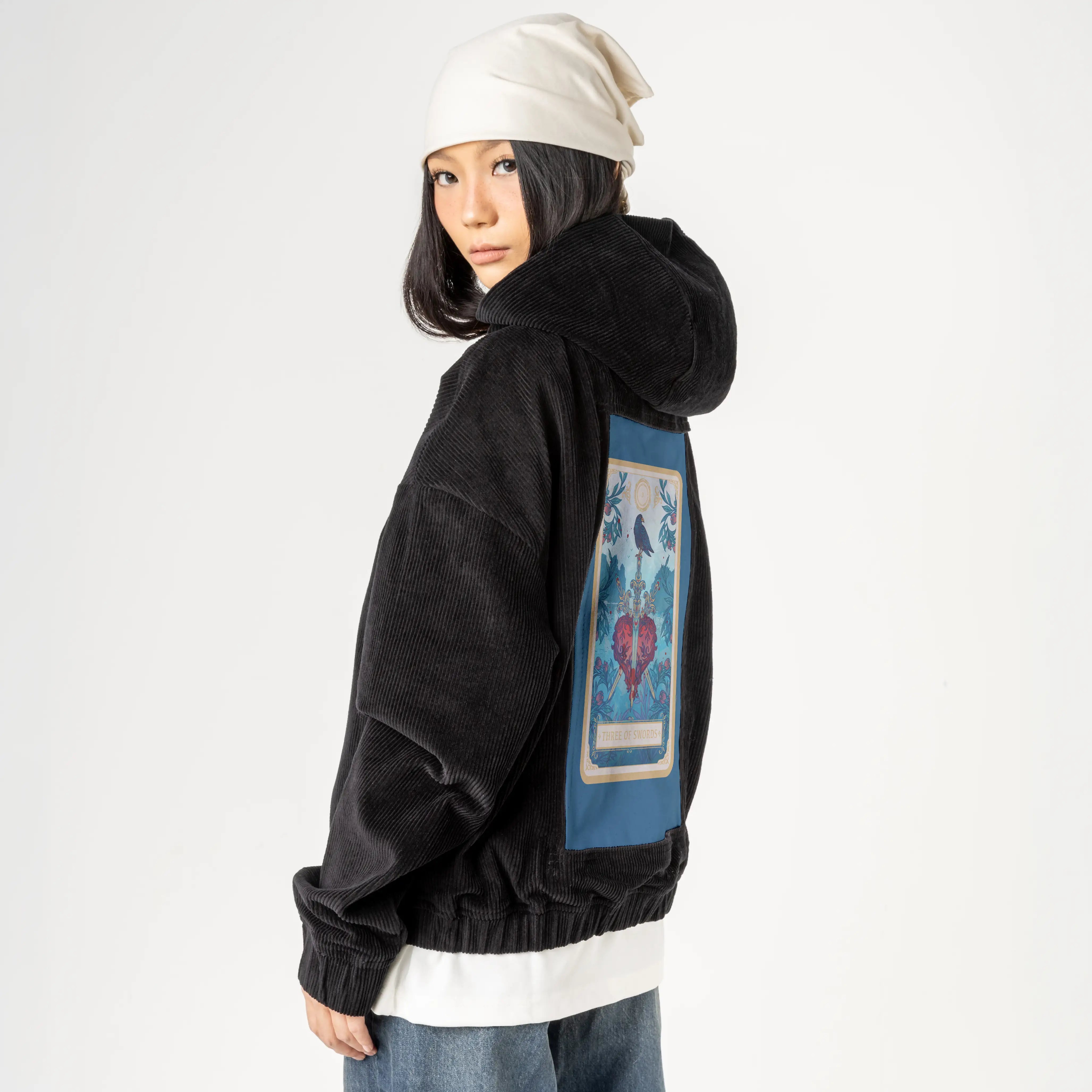 threeofswords patch on female retro cord hoodie in onyx