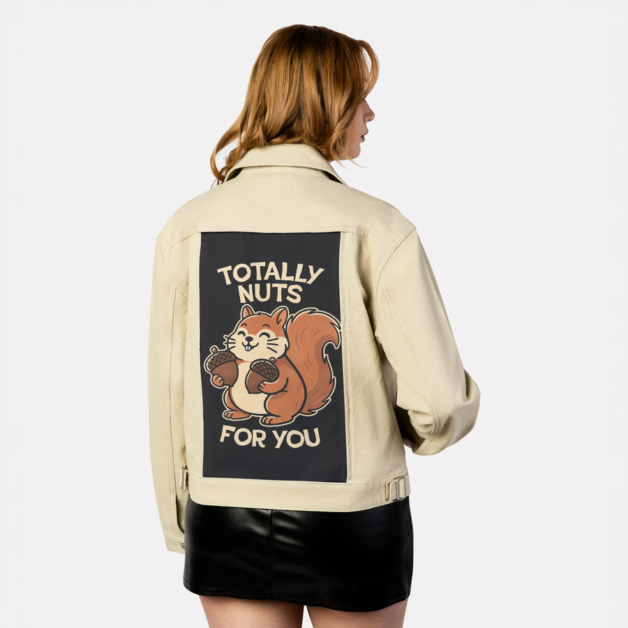 totallynuts patch on female atelier canvas jacket in tan