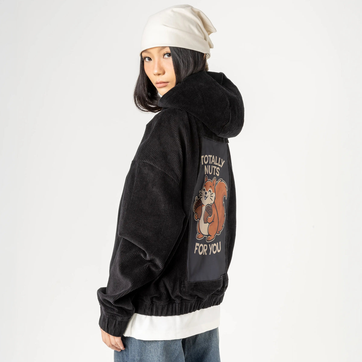 totallynuts patch on female retro cord hoodie in onyx