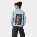 toxic patch on female og denim jacket in oceanside