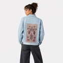 truelove patch on female og denim jacket in oceanside