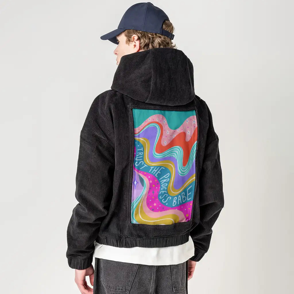 trusttheprocess patch on male retro cord hoodie in onyx