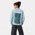 twisted patch on female og denim jacket in oceanside