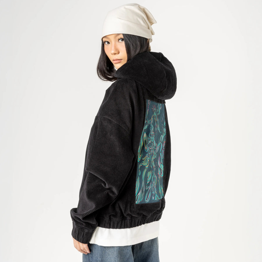 twisted patch on female retro cord hoodie in onyx
