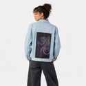 ultrapinktiger patch on female og denim jacket in oceanside