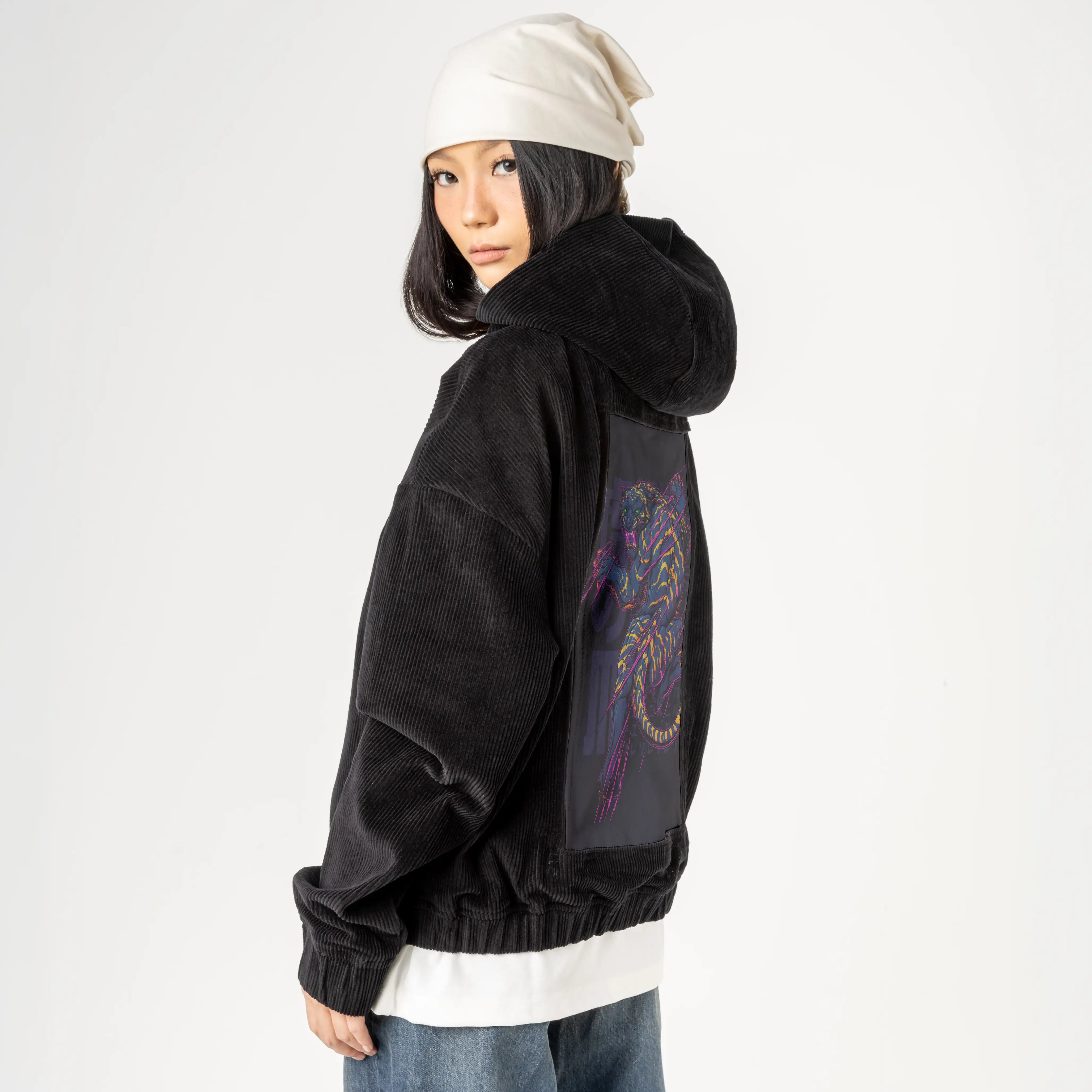 ultrapinktiger patch on female retro cord hoodie in onyx