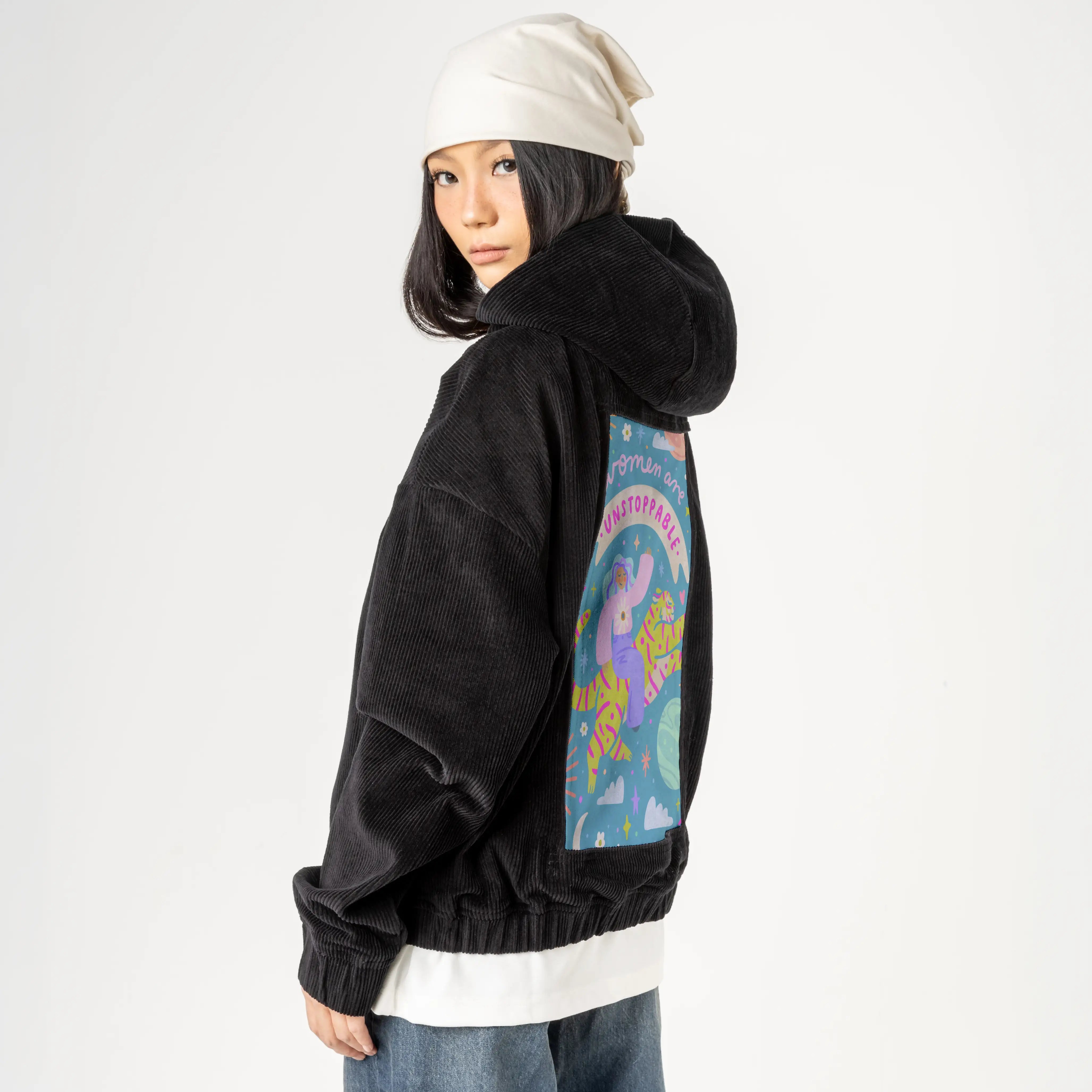 unstoppablewomen patch on female retro cord hoodie in onyx