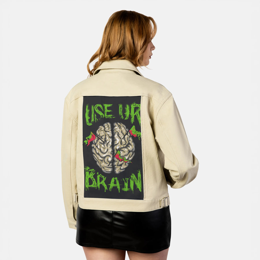useurbrain patch on female atelier canvas jacket in tan