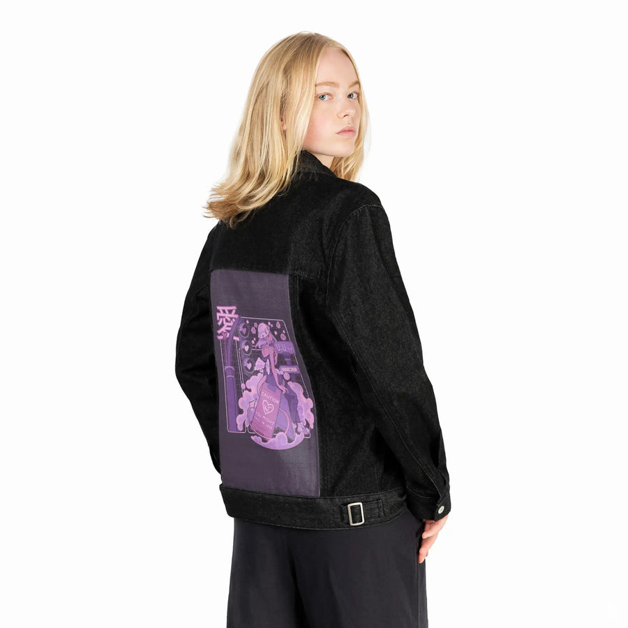 uwust patch on female og denim jacket in raven