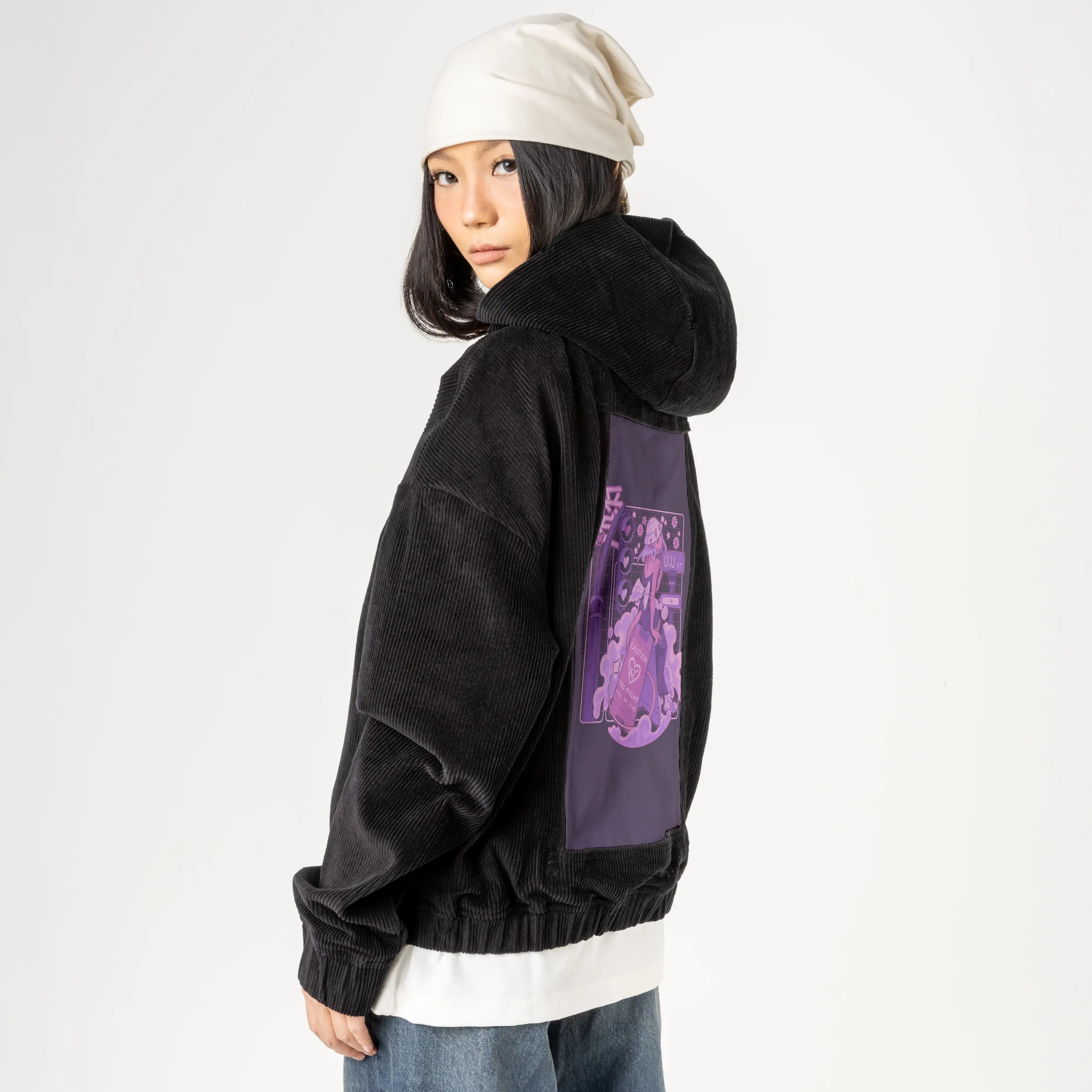 uwust patch on female retro cord hoodie in onyx