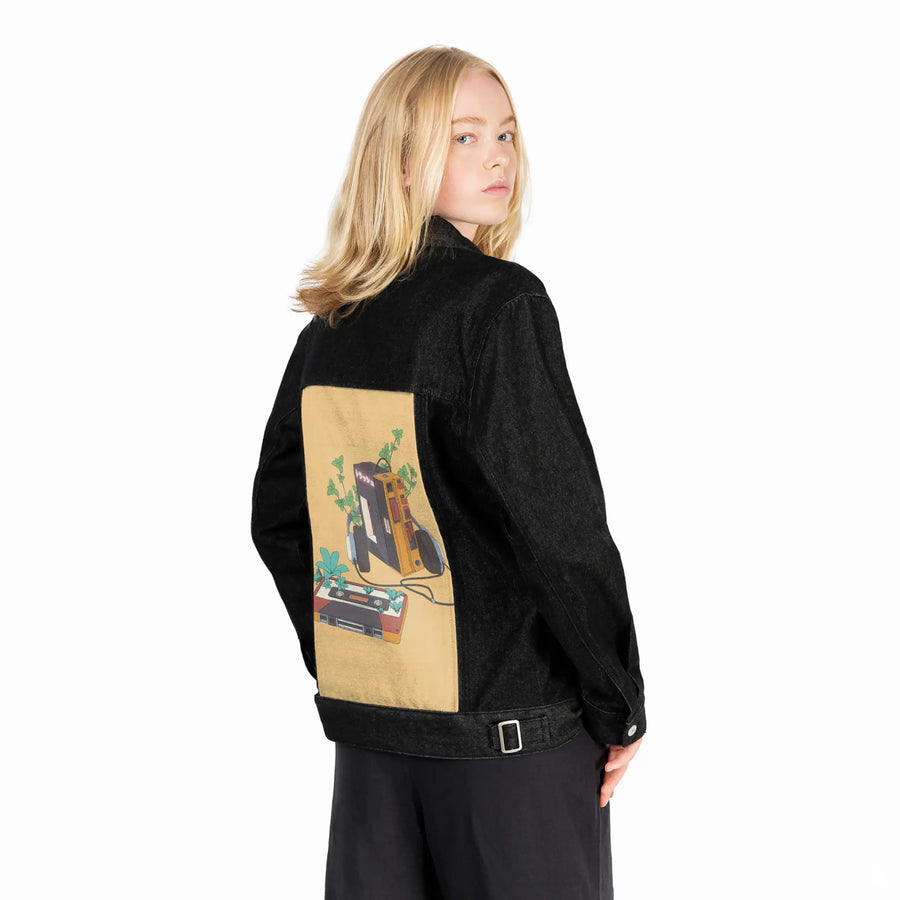 vintagecassette patch on female og denim jacket in raven