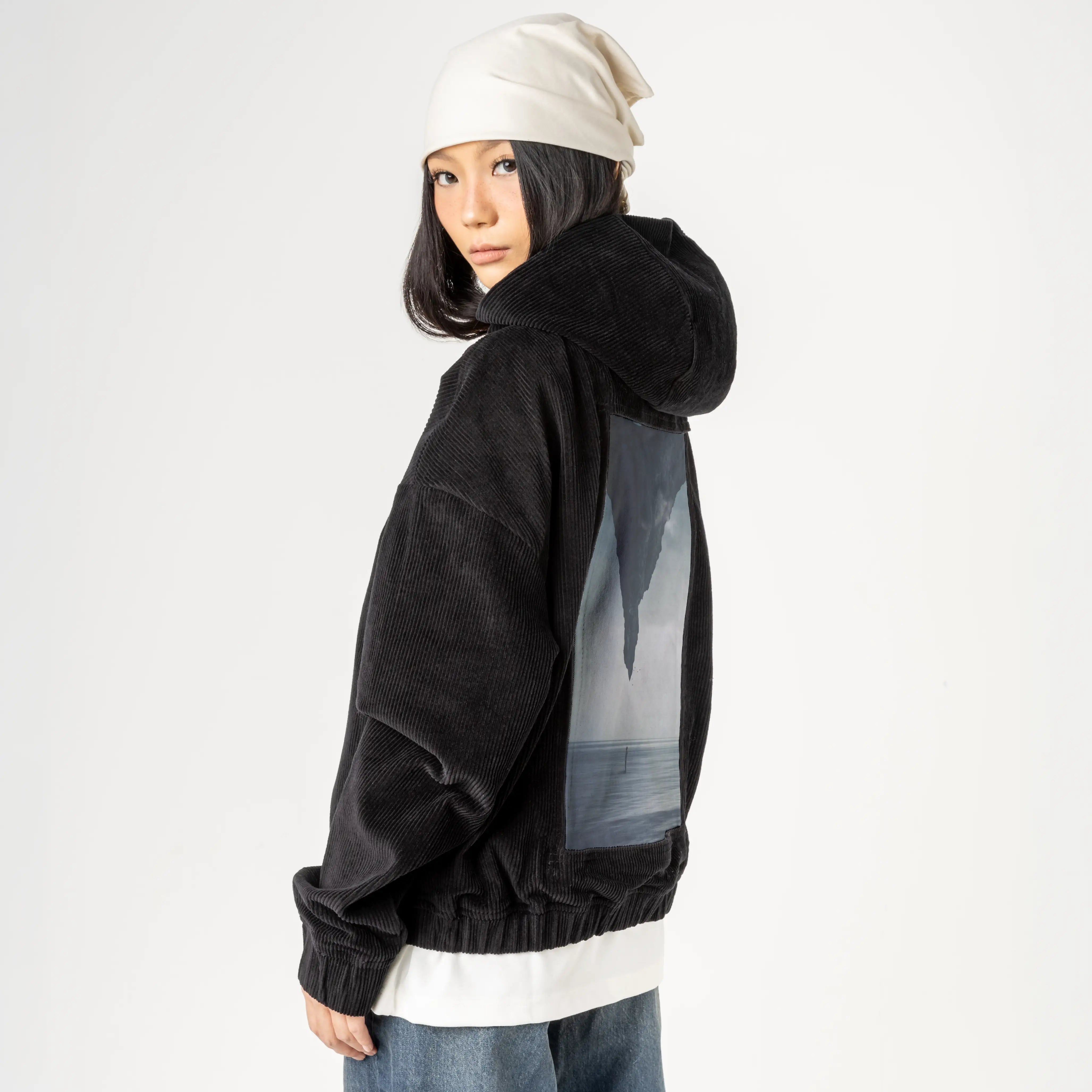 whatif patch on female retro cord hoodie in onyx