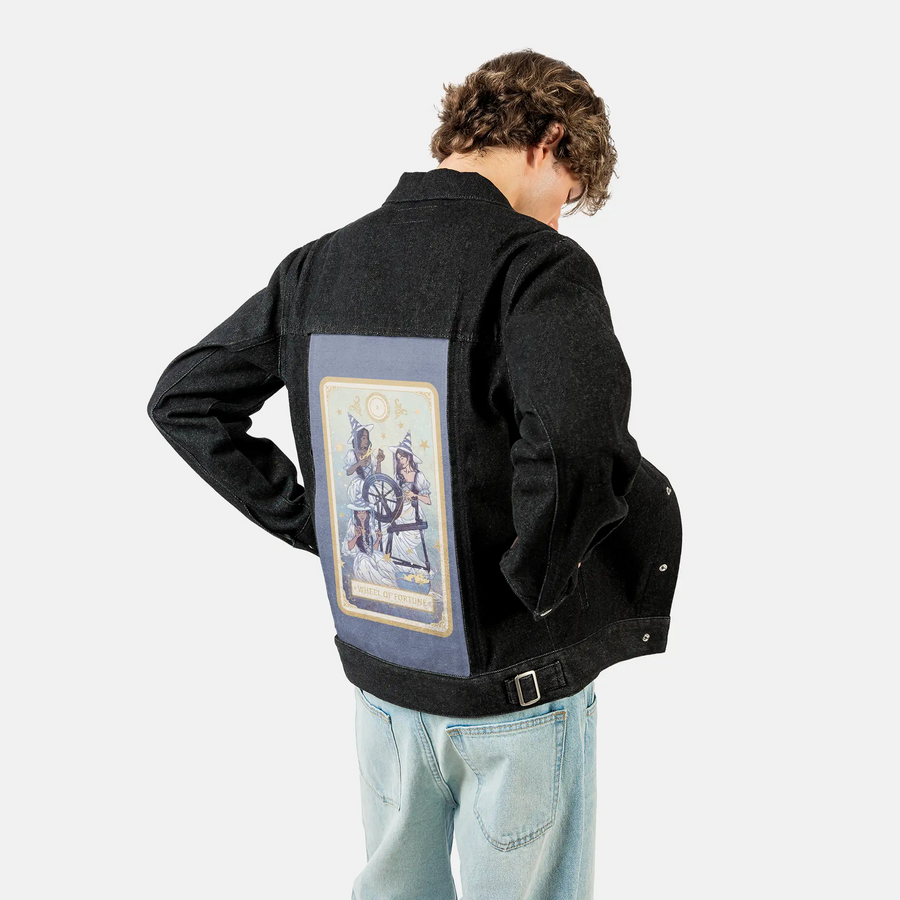 wheeloffortune patch on male og denim jacket in raven