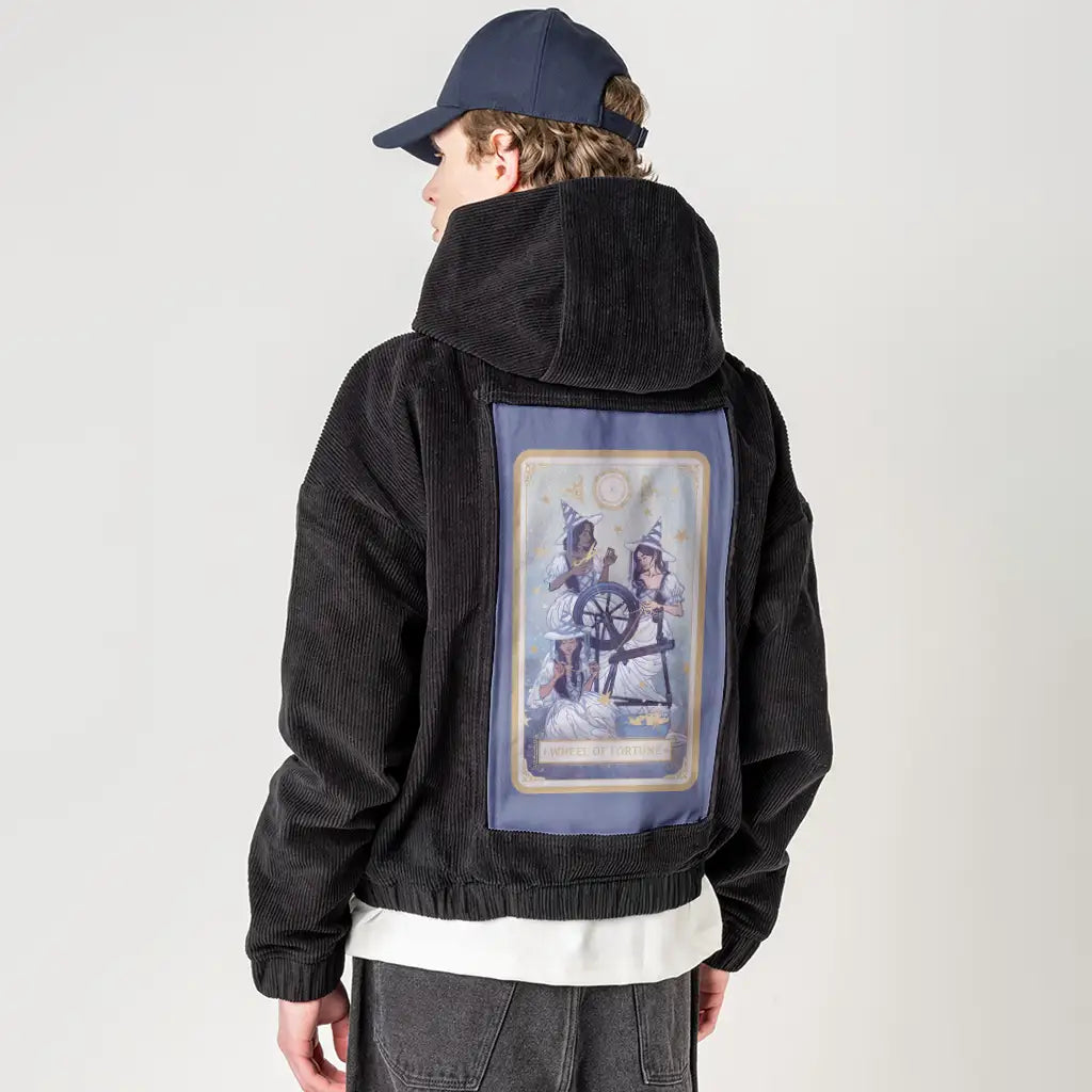 wheeloffortune patch on male retro cord hoodie in onyx