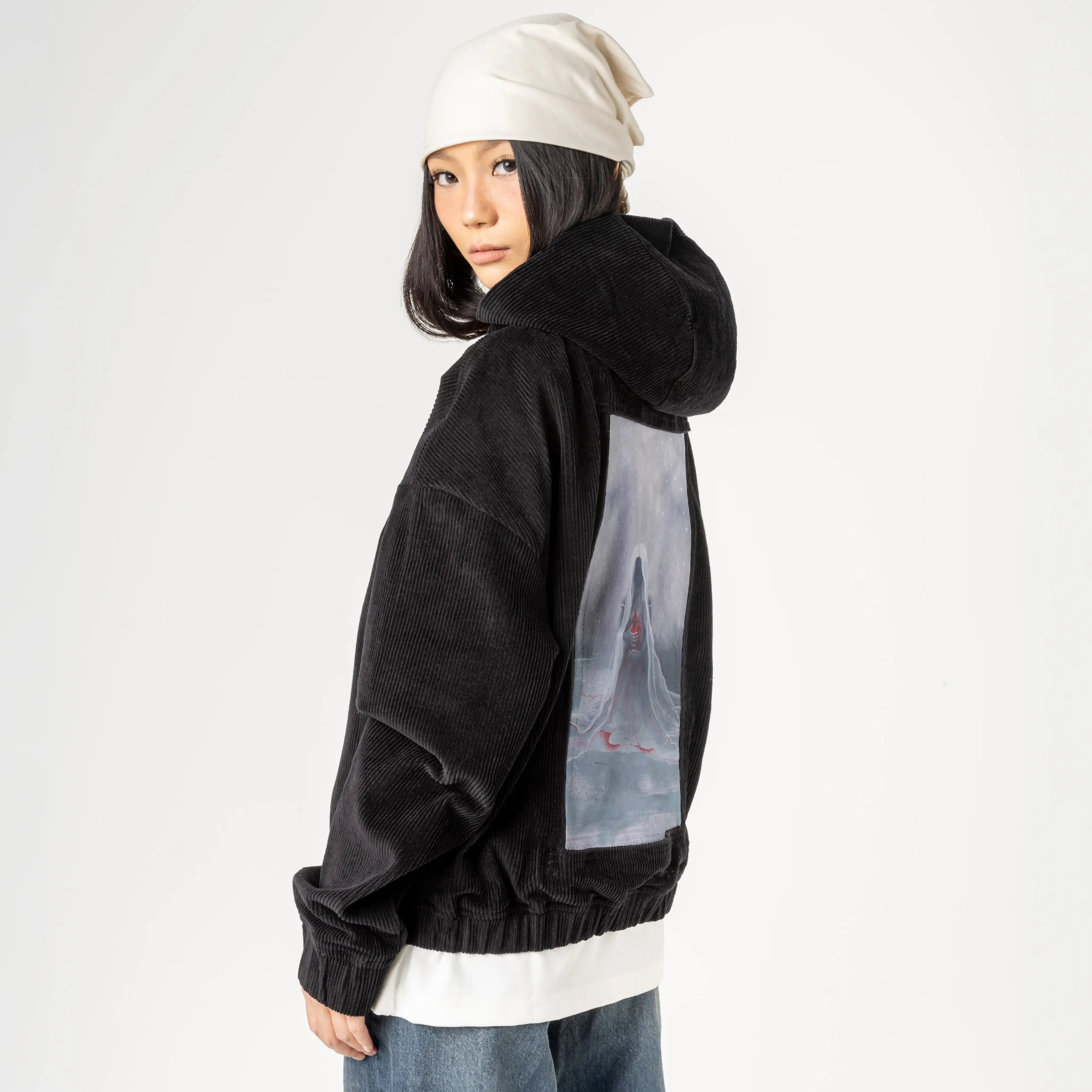 winter patch on female retro cord hoodie in onyx
