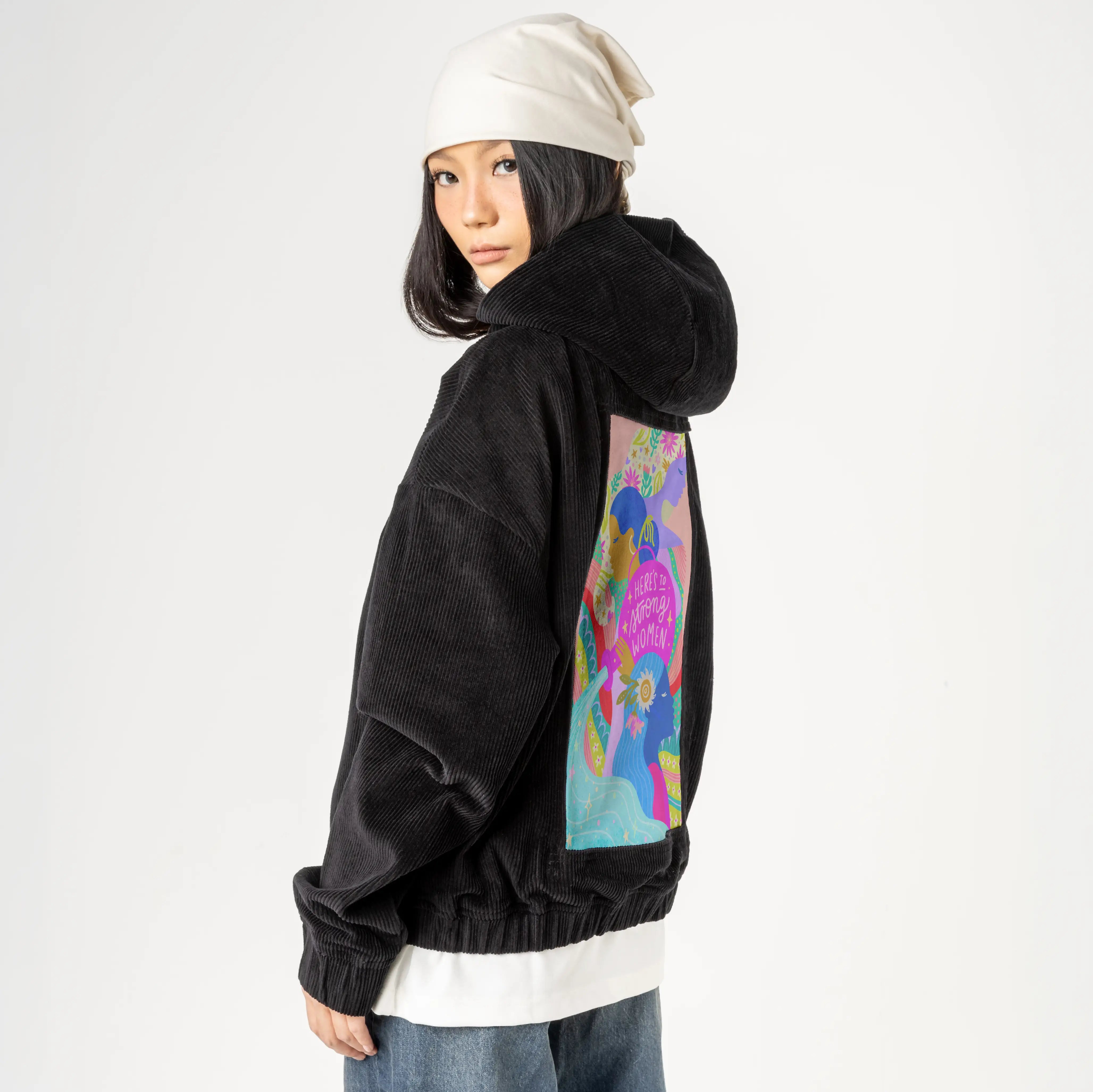 womensupporting patch on female retro cord hoodie in onyx