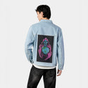 worlddomination patch on male og denim jacket in oceanside