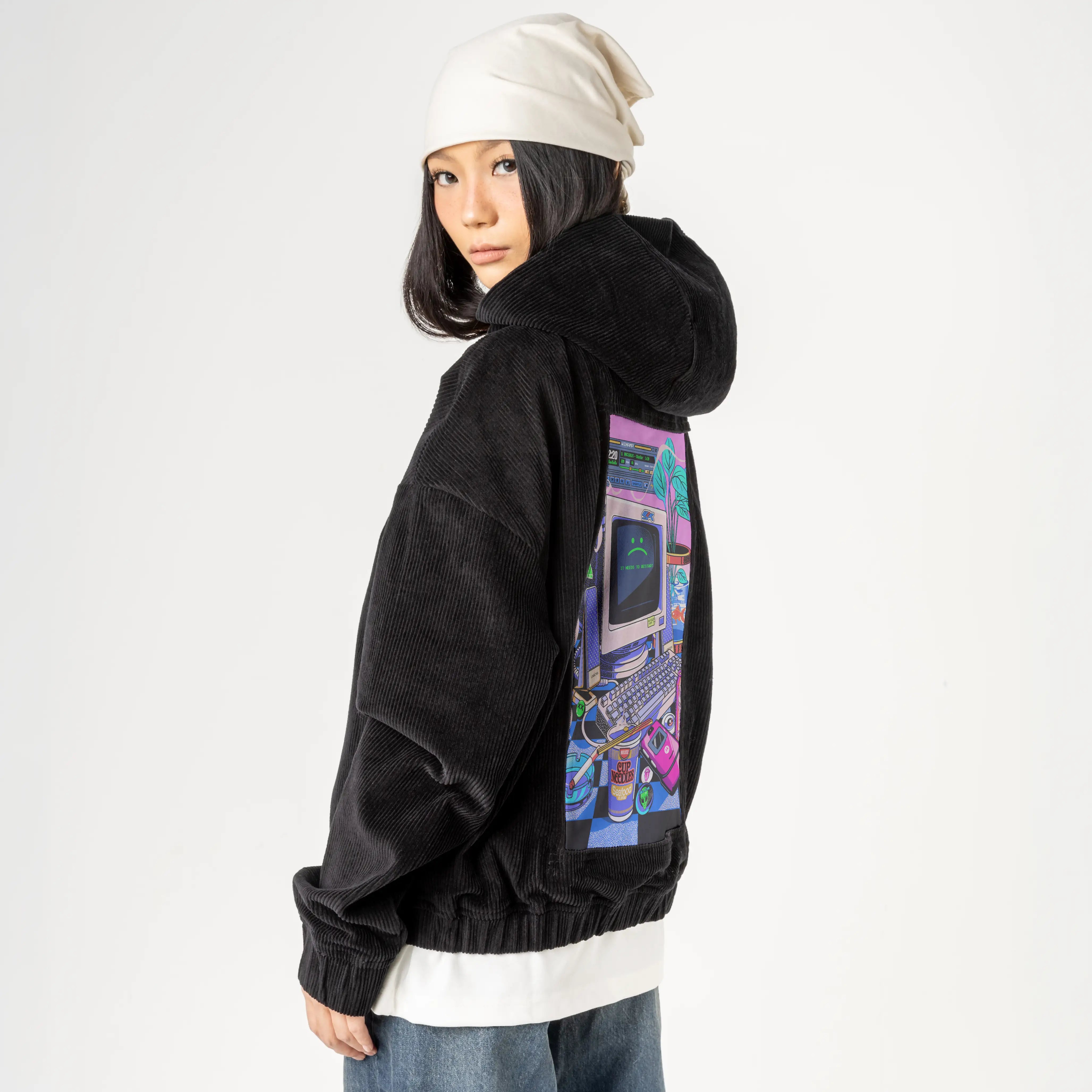 y2krestart patch on female retro cord hoodie in onyx
