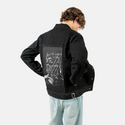 zeus patch on male og denim jacket in raven